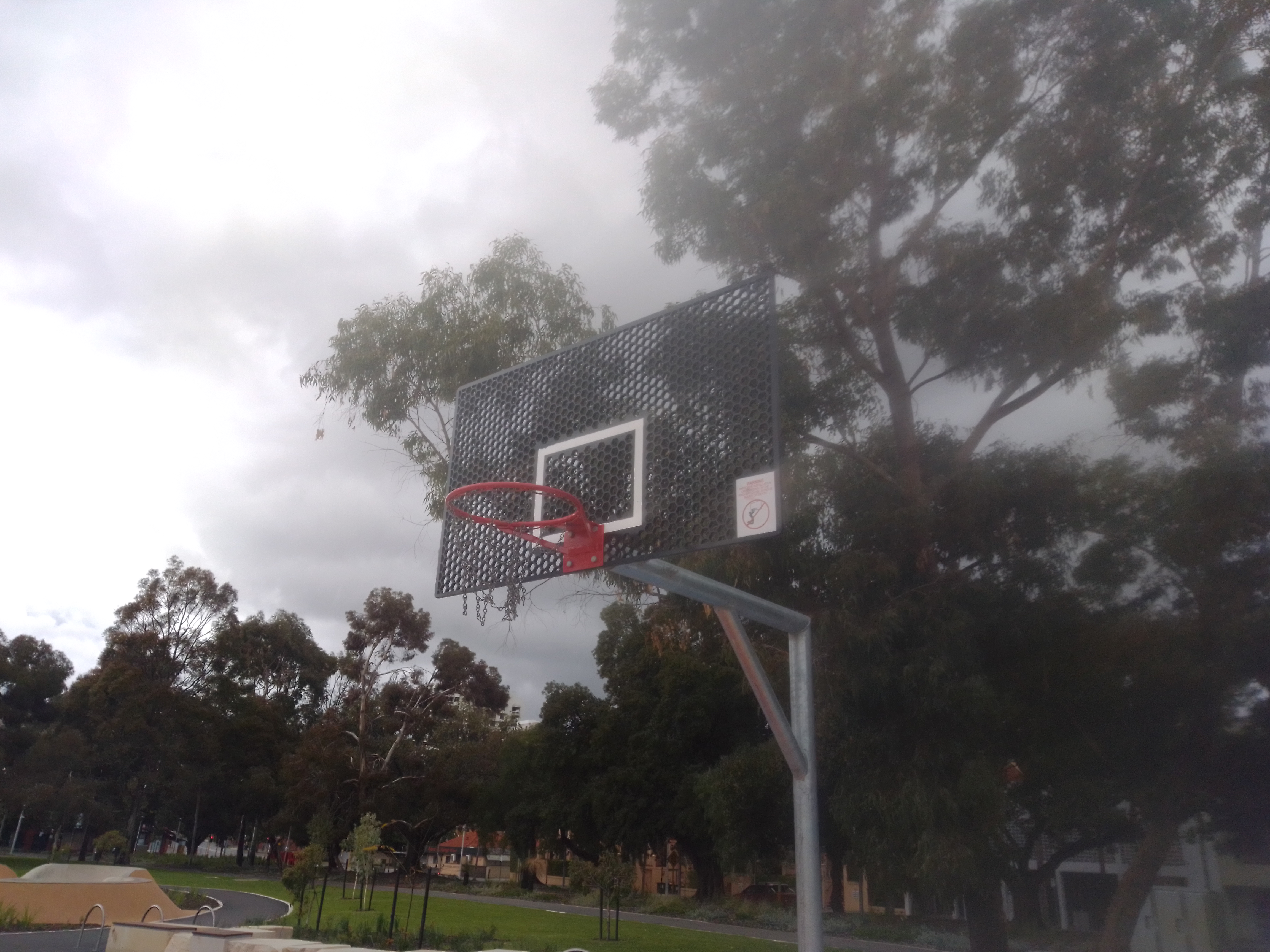 Basketball Court with Perforated Backboard